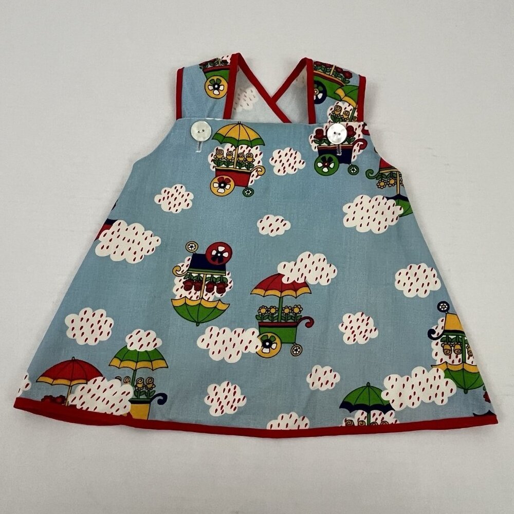 Vintage Fawn Togs Girl's 12 months Apron Dress Pinafore Spring Flower Showers